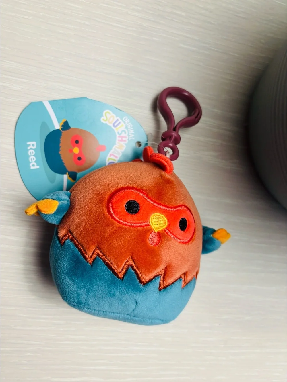Squishmallows Reed Owl Plush Clip - Orange & Blue with Purple Clip